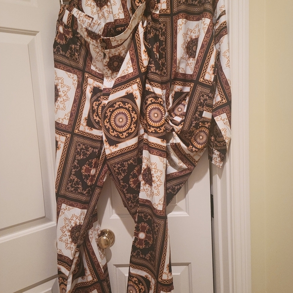 Other - Boutique 2 piece set size XL. Runs big colors Black white Gold. No tags
